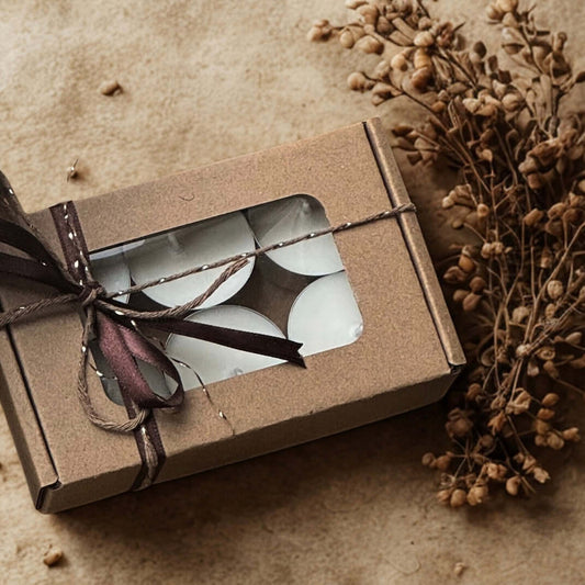 Aeryn - Scented Tealights in a beautifully packaged box, perfect for creating a warm ambiance.